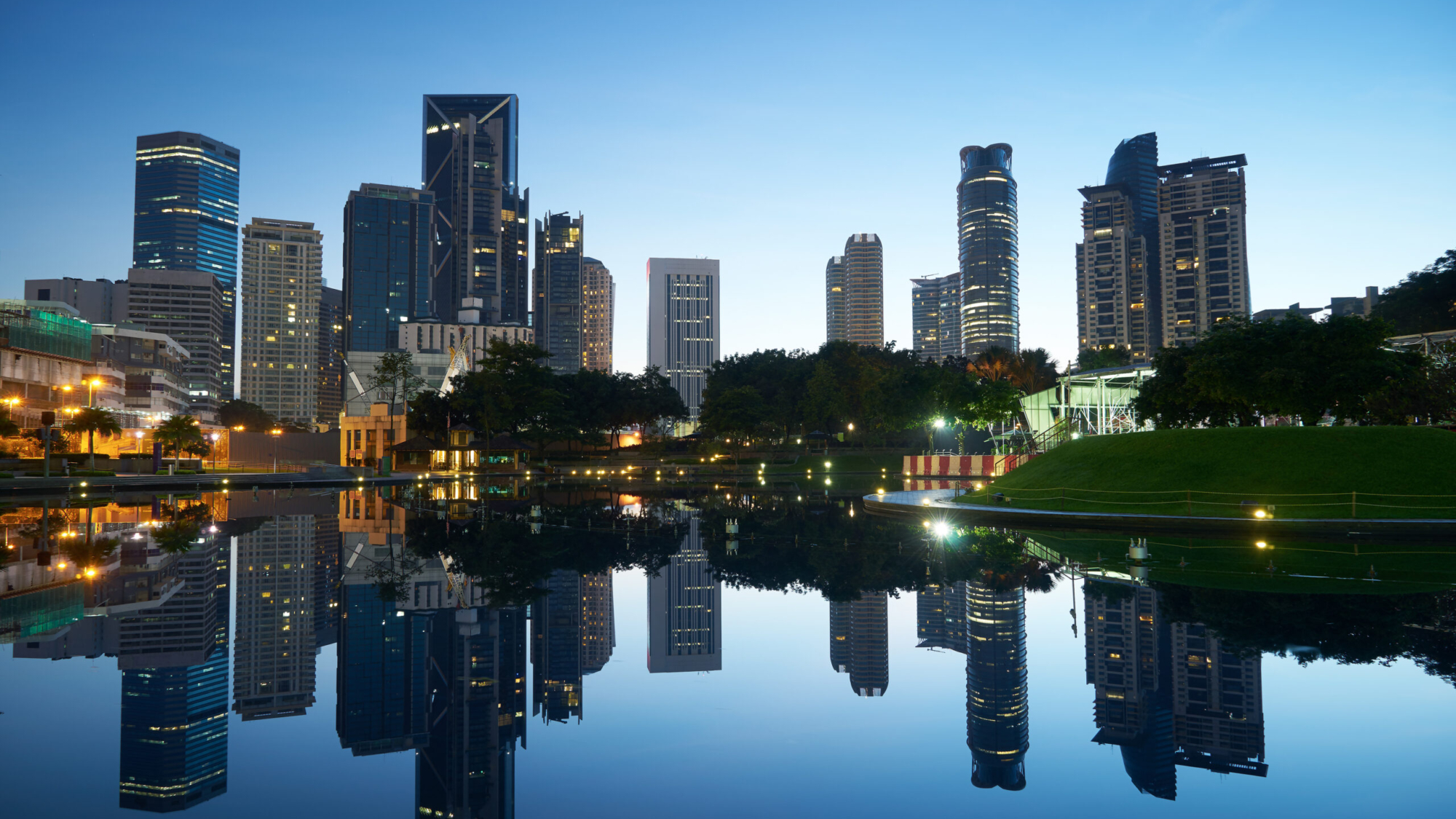 Kuala Lumpur city downtown at before sunrise with reflection of skyline, Kuala Lumpur, Malaysia