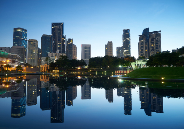 Kuala Lumpur city downtown at before sunrise with reflection of skyline, Kuala Lumpur, Malaysia