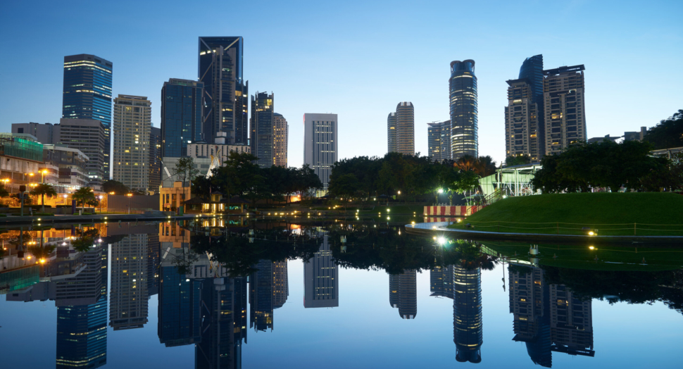 Kuala Lumpur city downtown at before sunrise with reflection of skyline, Kuala Lumpur, Malaysia